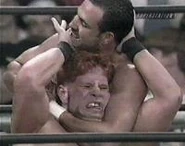 Thunder 2-18-99 2.jpg (6 KB) Chavo Guerrero putting a headlock on Lash LeRoux.