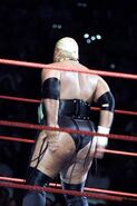 Rikishi behind