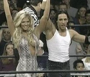 Kidman and Torrie Wilson celebrating.