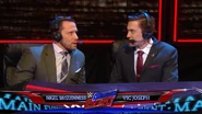 Nigel McGuinness in the "Main Event" commentary booth, along with his latest partner, Vic Joseph.