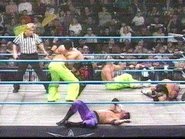 Shane Helms performing a move in the ring.