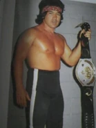 With the NWA International Junior Heavyweight Championship.