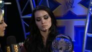 Renee Young interviews the NXT Women's Champion Paige in the backstage.