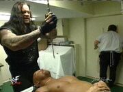 Undertaker tries to embalm Stone Cold - From "WWF Raw is War" in November 23, 1998