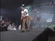 Disco Inferno walks to the ring.