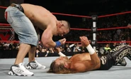 Cena giving the "You can't see me" sign to HBK.