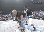 Thunder 5-24-00 5.jpg (15 KB) Norman Smiley gets low-blowed by Shane Douglas.