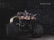 The Monster truck drives away with Rick Steiner and Tank Abbott.
