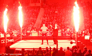 Kane celebrates Paul Bearer's return to Smackdown.