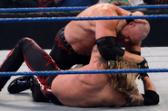 Kane fights Edge for kidnapping Paul Bearer.