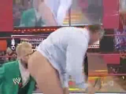 Hornswoggle almost kisses Vince's ass.
