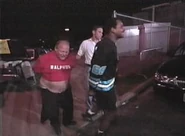 Norman Smiley and Ralphus are arrested for selling bootleg T-shirts.