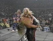 Gorgeous George attacks Kevin Nash.