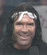 Scott Hall cutting a promo on Goldberg.