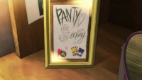 Panty and Stocking's autographs, which were placed in a frame in Chi's room.
