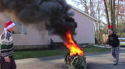 Pysco-kid-toches-christmas-tree.jpg