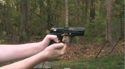 Pat Shooting A Gun.jpg