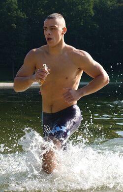 Soldier running in water