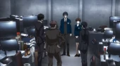 Ginoza informs the rest of the Division about Kasei's orders.