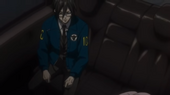 Inspector Nobuchika Ginoza talks to Kasei in her car.