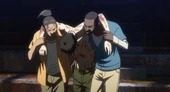 Babangida and Bun carrying Kogami.