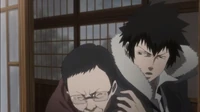 Kogami is stopped by a teacher.