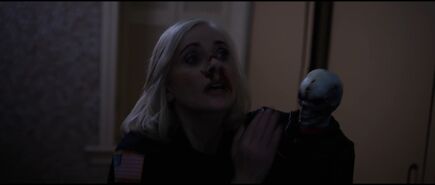 Carol being ambushed by a Blade puppet