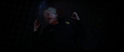 Carol dying form her neck wound