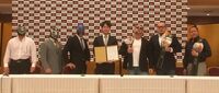 Contract signing between the champions R.E.D (Takashi Yoshida, Yasushi Kanda and Kazma Sakamoto) and the challangers Strong Machines (Strong Machine J, Strong Machine F and Strong Machine G)