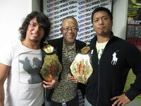 Shingo Takagi and YAMATO as Open The Twin Gate Champions during their KAMIKAZE reign