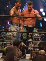 Ricochet with Matt Sydal as the winners of the 2015 Super Junior Tag Tournament