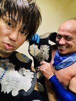 Susumu Yokosuka and Genki Horiguchi as Kyushu Pro Tag Team Champions