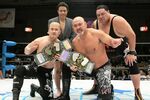 Keiji Mutoh and Kannazuki with the original title belts (AJPW)