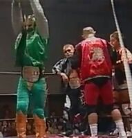 Mochizuki as the UWA World Trios Champions with Dragon Kid and Kenichiro Arai