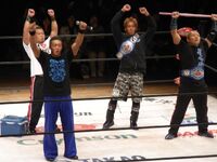 Gamma and Susumu Yokosuka as Open The Twin Gate Champions during thier WARRIORS-5 reign