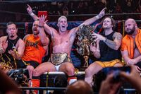 TMDK celebrating after Sabre the IWGP World Heavyweight Championship (missing Ryohei Oiwa and Robbie Eagles)