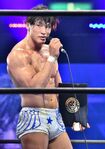 Kota Ibushi with his contract after his Tokyo Dome briefcase was destroyed