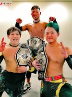 Kzy, U-T and Jacky "Funky" Kamei as Open The Triangle Gate Champions