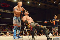 CIMA shaving Mondai Ryu's hair after their Passport vs Mask match