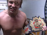 Jon Moxley as FIP World Heavyweight Champion