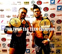 SANADA and EVIL as the IWGP Tag Team Champions in their first reign