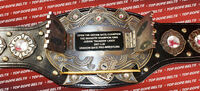 Old belt with the nameplate unlocked with Jushin Liger nameplate