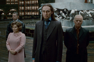 Four consequential members of the new regime: from left to right,  (investigator of alleged ),  (Head of the ),  (), and  (Head of the )