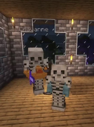 Chayanne with Missa, both dressed up like skeletons