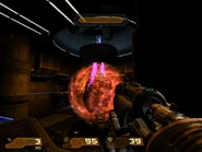 ...to reach the second floor. Here, aim at the ring above the brain to down the shield. When it's down, unload your Rocket Launcher and DMG on it. After a time, the shield recharges, so repeat it.