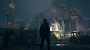 Anti-Monarch protesters promote their campaign to save the library
