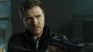 Liam Burke in Episode 1, "Monarch Solutions"