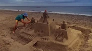 Anton building a sandcastle in Tahiti