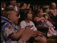 The audience patting their knees for the thunder