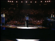 Raffi, Michael, and Connie clapping their hands for the rain